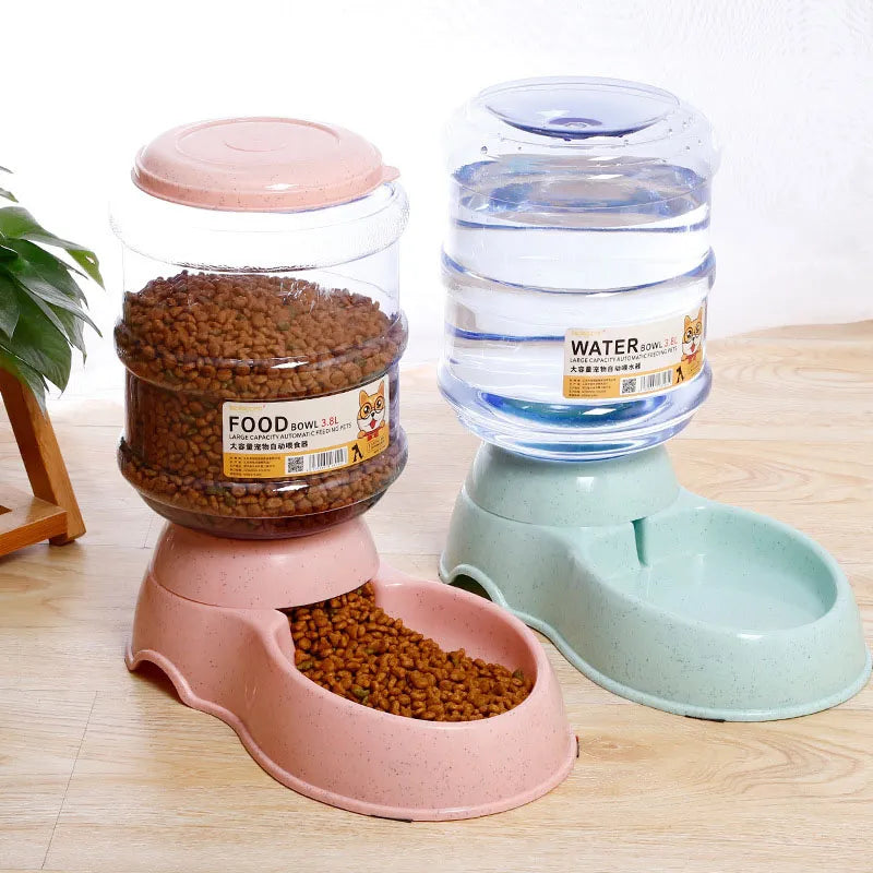 Automatic feeders, plastic water bottles, and bowls for cats and dogs.